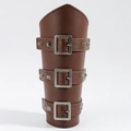 Detail of brown leather gauntlet with pyramid studs and adjustable metal buckles - Red Brown Artificial Leather