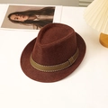 Deep brown straw fedora with striped band on a white table for summer sun protection - L(58-60cm) / Coffee