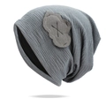 Detail shot of the wavy knit texture and cloud patch on the grey slouchy beanie hat - One Size / Gray