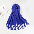Close-up of soft blue mohair scarf fabric texture with decorative fringe detail - Sapphire Blue