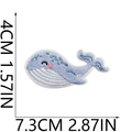 Detailed view of blue whale embroidery patch with measurements 7.3cm x 4.0cm - Blue Whale