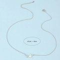 Silver stainless steel bird pendant necklace with diamonds on a blue background - Silver