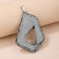 Macro detail of natural gray agate druzy pendant with sparkling rhinestone pavé edges - Irregular Shape / Silver