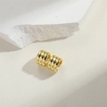 Detail view of gold-plated geometric C-shaped ear cuffs with triple ribbed texture design - Triple Ridged Polished / Gold Multi-Layer