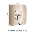 Strong adhesive wall hook in brushed gold finish measuring 6x6cm with transparent flower - Brushed Gold / Gold Small Hook