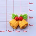 DIY Christmas resin accessory featuring double yellow bells with red berries and green leaves - Bell