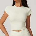 Haut de sport blanc cassé cintré avec manches courtes et legging à taille en V croisé - S / Abricot Crème