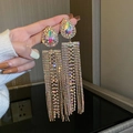 Macro shot of silver needle square fringe earrings with colorful rhinestones and tassels - Gold Rhinestone Tassel (Silver Earring Post)