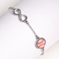 Nahaufnahme des silbernen Unendlichkeits-Armbands mit Zirkonia und Baseball-Anhänger - Silber Rosa Baseball (16+5cm)