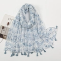 Detailed view of light blue floral voile scarf with delicate fringe tassels on the edge - Light Blue Floral Style (XB954)