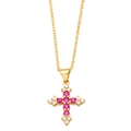 Goldene Kreuzkette mit rosa Zirkonia und weißen Diamantakzenten an einer feinen Kette - Fuchsia