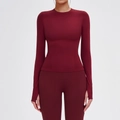 Bordeaux naadloze yogaset met shirt met lange mouwen en duimgaten en bijpassende sportlegging - S / Kersenrood