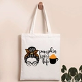 Detail of canvas tote bag featuring pumpkin spice life graphic and seasonal pumpkin motif - Pumpkin Spice Life White Base