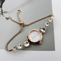 Rose gold quartz bracelet watch with round dial and crystal drop chain design - Rose Gold White