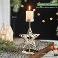 Golden star metal candle holder with hollow engraving on a snowy festive background - Five-star