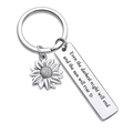 Detailed close-up of sunflower keychain with engraved inspirational quote on silver tag - Darkest night will end (With heart)