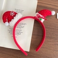 Christmas headband featuring two red mini Santa hats with silver snowflakes and green bells - Double Santa Hats Plush Christmas Headband