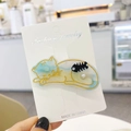 Cute acetate cat hair clip in blue and yellow gradient with a small fishbone charm - Blue Sky Cat