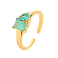 Adjustable gold titanium ring featuring rectangle green and pear-shaped teal zircons - Open Size 7 / October