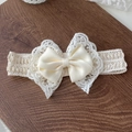 Creamy white lace baby headband featuring a large ribbon bow on a rustic wooden base - D20 Double Layer Bow Wide Headband