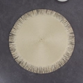 Detail of round beige woven placemat with fringed edges and spiral texture design - Beige with Tassels