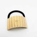 Elegant black elastic hair tie with textured golden metallic scale pattern accent - Scale Embossed Texture (Hair Tie 53)