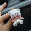 Detail of white plush teddy bear car vent clip with golden crown and sparkling rhinestone ears - White Teddy Bear Vent Clip / White