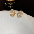 Elegant gold butterfly earrings with sparkling cubic zirconia on white ceramic tray - 48# Gold Heart Butterfly