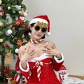 Festive Christmas outfit with 2025 golden party glasses and red velvet mini dress - Gold Connected 2025 Glasses