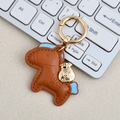 Brown leather horse keychain with light blue accents and golden lucky money bag charm - Mini / Brown