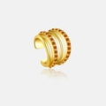 Vista macro detallada del brazalete de oreja dorado multicapa con diamantes de imitación ámbar - Plata 925 / Rojo Anaranjado