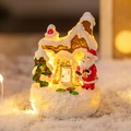 Leuchtendes Weihnachts-Lebkuchenhaus aus Harz mit Weihnachtsmann und Schnee - Weihnachtsmann Schneehaus