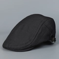 Detail of black ivy cap showing breathable textured fabric and adjustable metal buckle - M (56-58cm) / Black