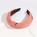 Cross-knotted coral pink headband with pleated fabric texture and black inner lining - Orange Red