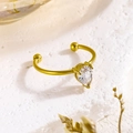 18K gold-plated stainless steel open ring with pear-cut zircon on white stone surface - 3355 Ring / Gold-White Zirconia