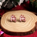 Christmas reindeer stud earrings with red snowflake pattern on white wood display - White Reindeer