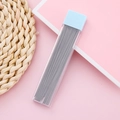 Light blue pencil lead refill case with HB leads on a minimalist soft pink background - 0.5mm / Lead Refills (100 Pcs)