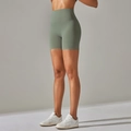 Women's high-waisted sage green yoga shorts with skin-friendly nude-feel fabric - Light Grass Green
