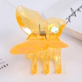 Vibrant translucent yellow iridescent butterfly hair claw clip with matte finish effect - Glossy Holographic Yellow