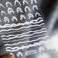 Minimalist white wavy nail art stickers with arch designs on a transparent sheet - TS-698 Surfing-Flat