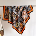Macro detail of silk scarf featuring chain patterns and horsebit motifs in orange and grey - 90x90cm / Orange (FN153-1)