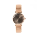 Orologio elastico da donna in oro rosa con quadrante soleil e strass su sfondo bianco - Oro rosa