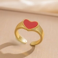Macro detail of adjustable gold ring featuring a red heart with tiny bead edging - Gold Red Shell Heart (6991)
