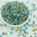 Macro view of frosted glass beads with inner gold foil for DIY jewelry making - 6mm Dunhuang Mixed Color