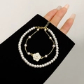 Detail of a gold-plated camellia flower and pearl double-layer bracelet set for women - Gold Camellia Set (Real Gold Plating)