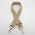 Detailed view of beige adjustable shoulder strap with premium gold metal hardware buckles - Apricot / Gold Hook