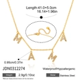 Detail of gold MAMA necklace with dimensions 41 plus 5 cm and crystal inlaid letters - Iced Out MAMA Letter Necklace (JDN0312274)