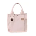 Borsa tote in tela crema con tasca esterna e ciondolo in metallo variante beige - Bianco