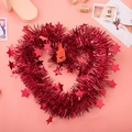 Dettaglio di ghirlanda in tinsel rosso con cuori e stelle per decorazioni natalizie - 2 Metri Per Pezzo / Pentagramma Rosso