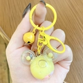 Yellow cartoon character oil liquid sand keychain with matching bell and lobster clasp - Mini Mickey Head Milk Bean - Yellow